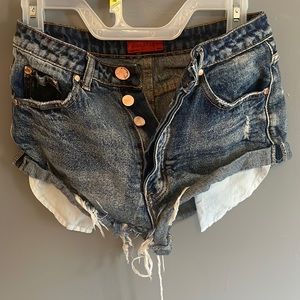 small dark Signature 8 jean short shorts.
